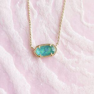 Kendra Scott Gold and Blue Necklace with Elegant Design
